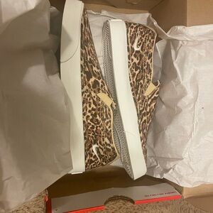Nike cheetah slip on shoes